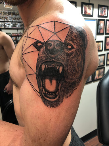 Find top of head tattoo ideas for your next unique tattoo in Alamosa at The Shop Tattoo & Comics
