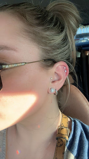 Explore black power tattoo ideas, creative tattoo ideas in Sarasota, available at Banter by Piercing Pagoda