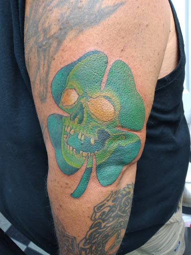 Explore cover up tattoo ideas on forearm, creative tattoo ideas in Ormond Beach, available at Tropical Tattoo Inc