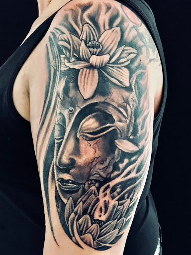 Explore male bicep tattoo ideas, creative tattoo ideas in Cape Coral, available at Raabery Ink Society