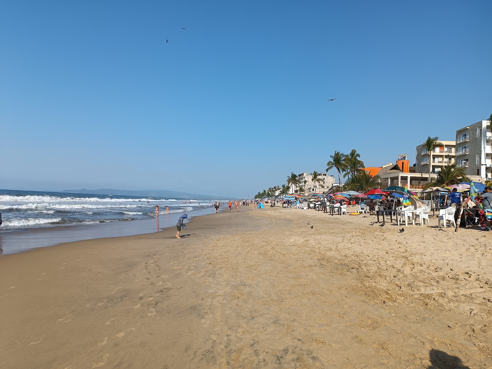 Foto di Playa Rincon de Guayabitos con una superficie del sabbia beige