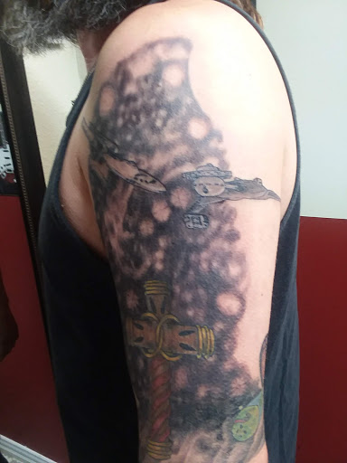 Explore minnesota vikings tattoo ideas, creative tattoo ideas in Clovis, available at Diamond in the Ruff