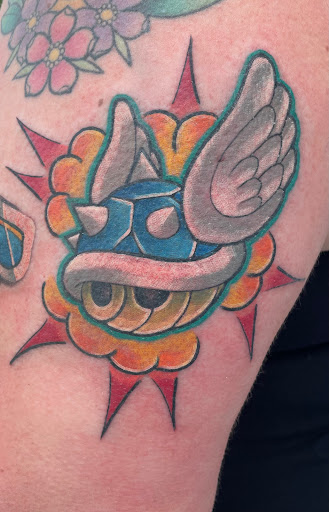 Explore red ink tattoo ideas, creative tattoo ideas in Myrtle Beach, available at Elite Ink Tattoos of Myrtle Beach