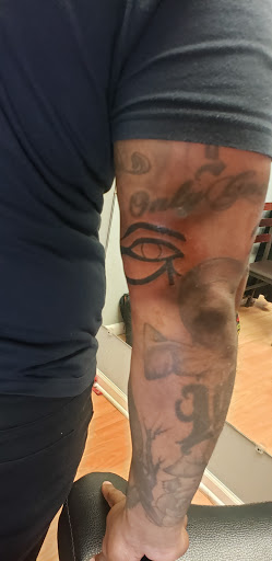 Explore cover up tattoo ideas for wrist, creative tattoo ideas in San Antonio, available at Twisted Tattoo