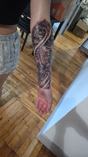 Explore gun tattoo ideas for men, creative tattoo ideas in Whitehall, available at Sick Ink