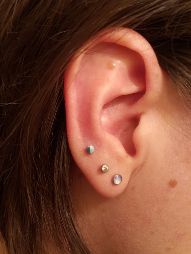 Explore inside ear tattoos ideas, creative tattoo ideas in Puyallup, available at Evergreen Body Mod