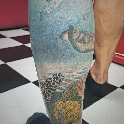 Explore logging tattoo ideas, creative tattoo ideas in Medina, available at Art In Motion Inc Tattooing