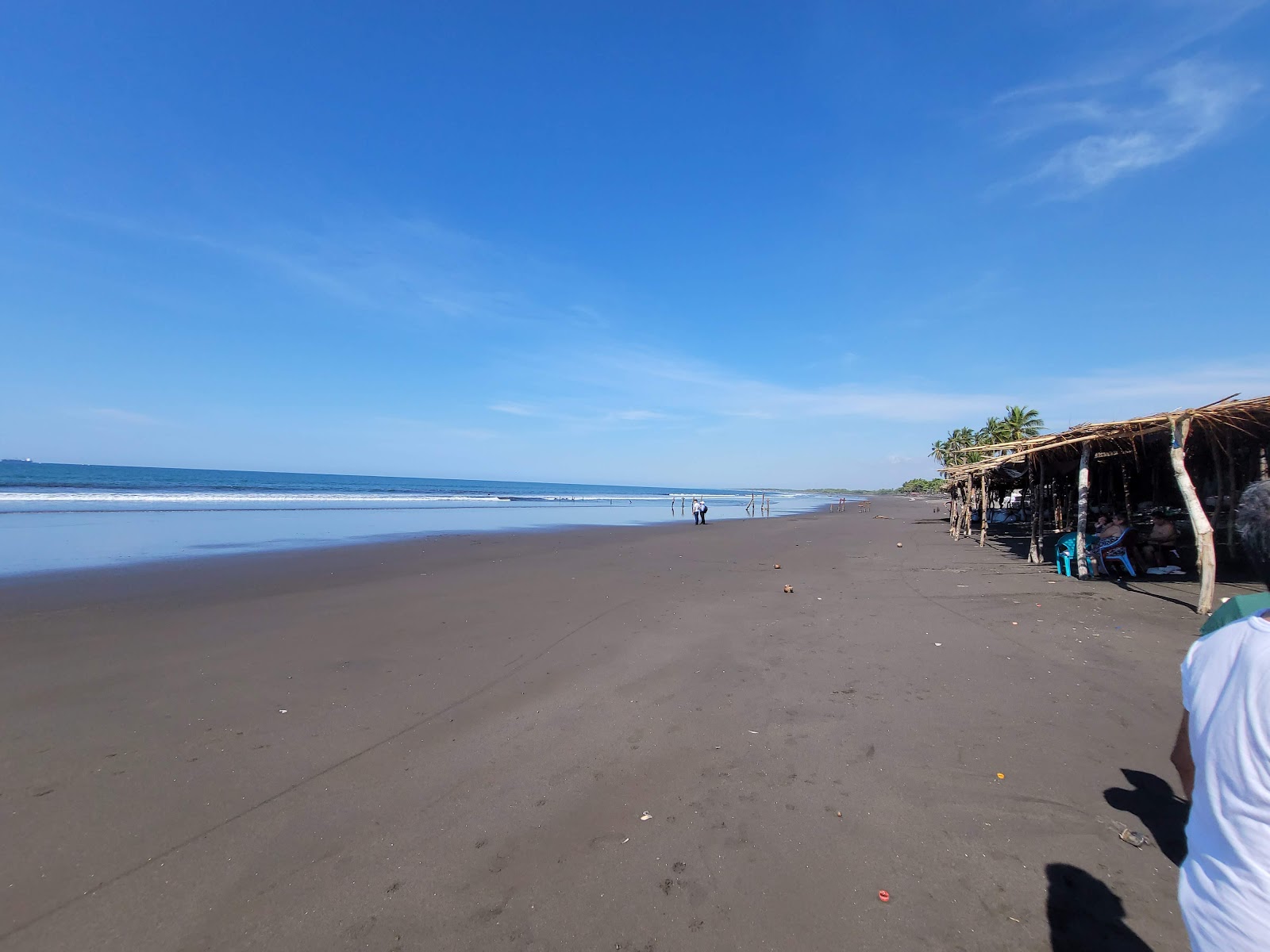 Foto av Acajutla Beach med blå rent vatten yta