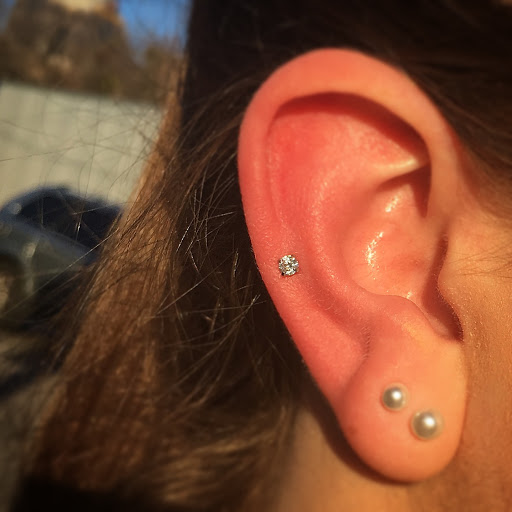 Find leg tattoo ideas for guys for your next unique tattoo in Cary at Fine Art Body Piercing By Lilith Mae