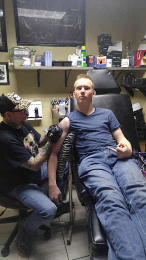 Find tattoo ideas roses for your next unique tattoo in Minneapolis at Tattoo Asylum