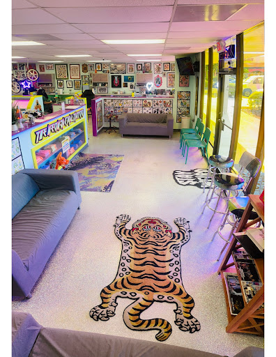 Explore nail technician tattoo ideas, creative tattoo ideas in Houston, available at The Neon Jackal Tattoo