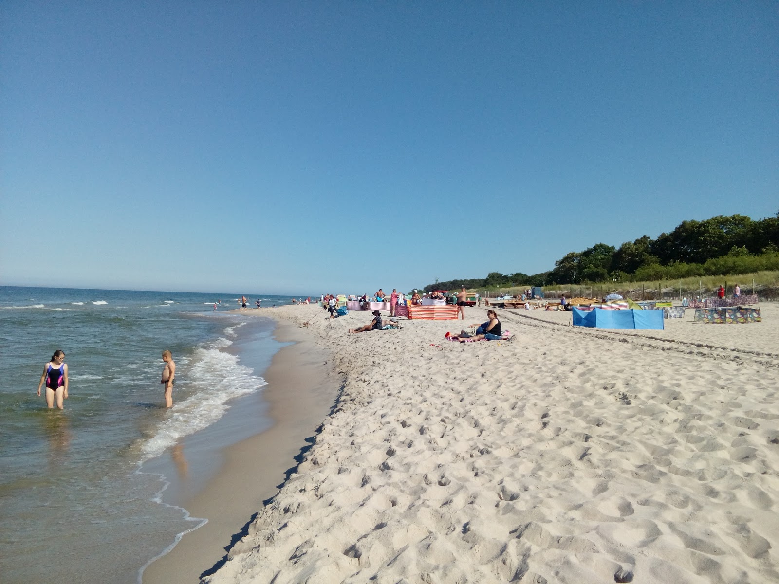 Valokuva Jastarnia Beachista. pinnalla beige iekka:n kanssa