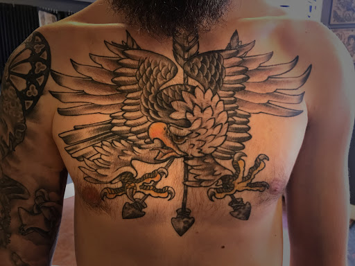 Explore softball tattoo ideas, creative tattoo ideas in Osage Beach, available at Rabbits Foot Tattoo Parlor