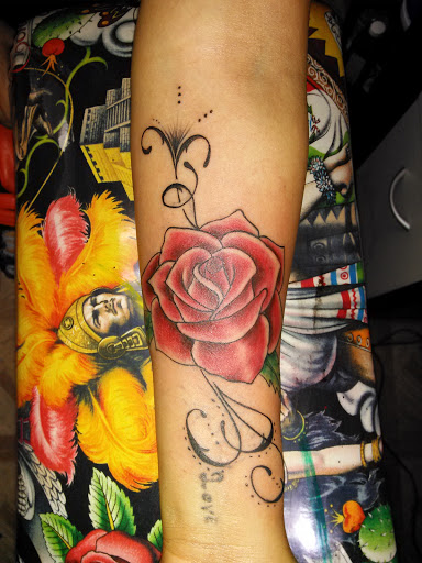 Explore purple rose tattoo ideas, creative tattoo ideas in Los Angeles, available at South Central Tattoos