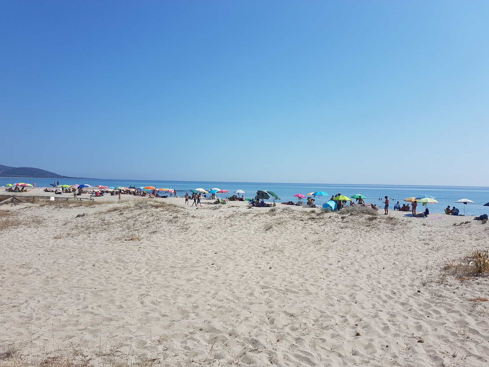Foto av Spiaggia di San Giovanni med lång rak strand