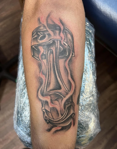 Explore philosophical tattoo ideas, creative tattoo ideas in Warner Robins, available at Untold Pain Tattoo Studio