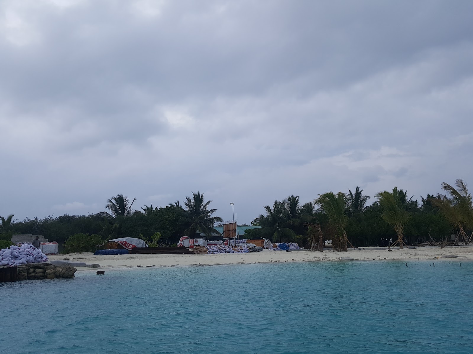 Foto von Kunaavashi Beach mit beiger sand Oberfläche