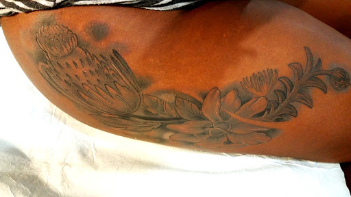 Explore knitting tattoo ideas, creative tattoo ideas in Virginia Beach, available at World Famous Blue Horseshoe Tattoo and Piercing Independence