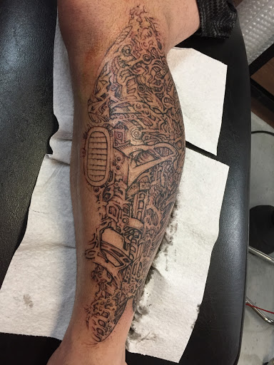 Explore back forearm tattoo ideas, creative tattoo ideas in West Fargo, available at Addictions Collective Studios