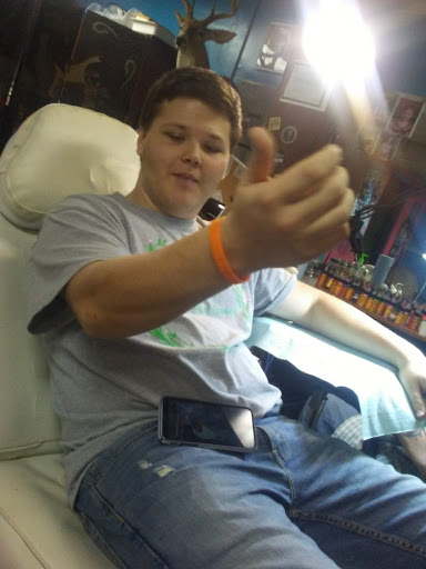 Explore side tattoo ideas, creative tattoo ideas in Lancaster, available at Inkd 4 life Piercing