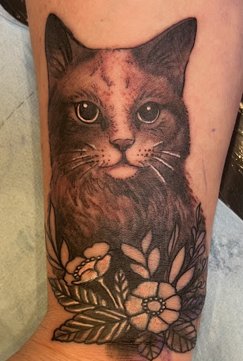 Explore cover up tattoo ideas on hip, creative tattoo ideas in Saint Paul, available at Beloved Studios