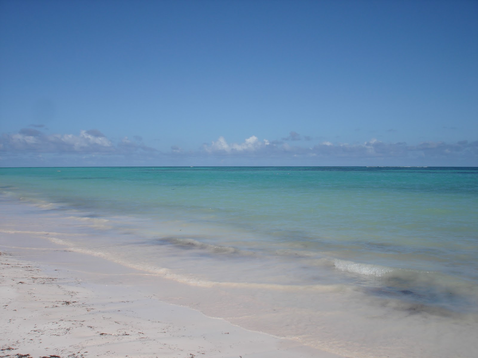 Foto di Spiaggia di Juanillo - luogo popolare tra gli intenditori del relax