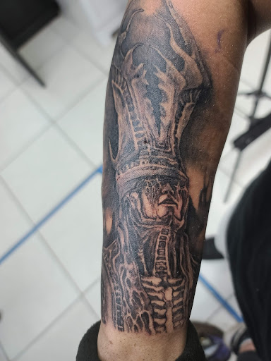 Explore behind ear tattoo ideas for guys, creative tattoo ideas in Johnston, available at EMPIRE STUDIO-RI