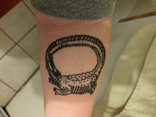 Explore honeysuckle tattoo ideas, creative tattoo ideas in Cocoa, available at Rorschach Tattoo Shop and Piercing Studio