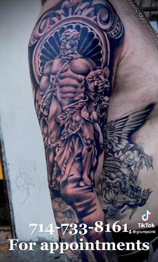 Explore around the knee tattoo ideas, creative tattoo ideas in Orange, available at Ink Activitiez Tattoo