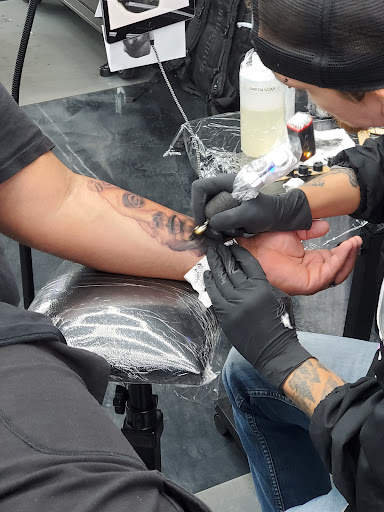 Explore fire force tattoo ideas, creative tattoo ideas in Hollywood, available at Sacred Eye Tattoos