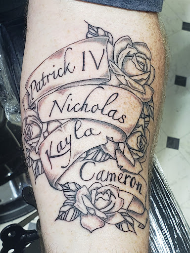 Explore tattoo ideas for crosses, creative tattoo ideas in Orange, available at Smokin Irons Tattoo