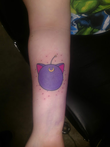 Explore orchid tattoo ideas, creative tattoo ideas in Sioux Falls, available at Outlaw Tattoos