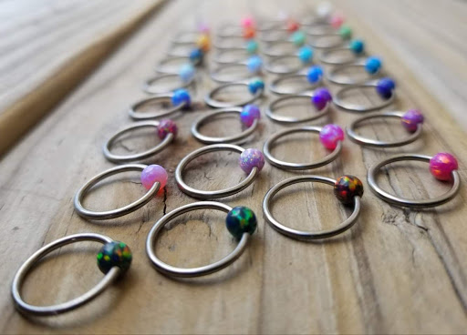 Explore tweety tattoo ideas, creative tattoo ideas in Toledo, available at Piercings by Caitlin presents Holier Toledo