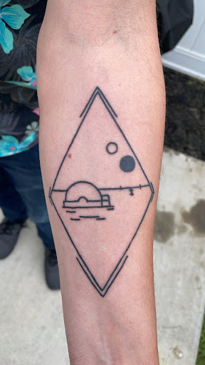 Explore thigh tattoo ideas for women, creative tattoo ideas in Rockwood, available at Lake state tattoo co