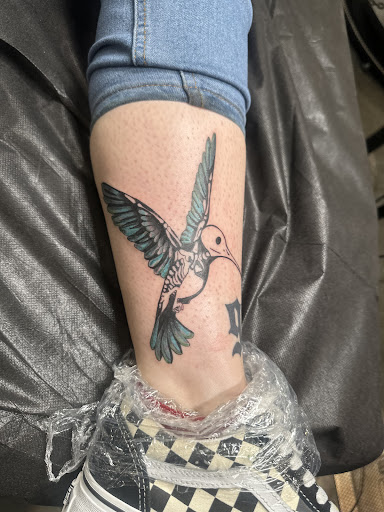 Explore wrap around arm tattoo ideas, creative tattoo ideas in Downey, available at Superior Ink Tattoo and Piercings