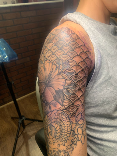 Explore birthday month tattoo ideas, creative tattoo ideas in Cape Coral, available at UNRIVALED INK