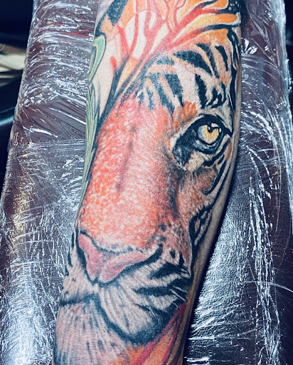 Explore amethyst tattoo ideas, creative tattoo ideas in Midland, available at The Company Ink