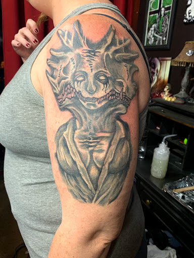 Explore mic tattoo ideas, creative tattoo ideas in Phoenix, available at The Snooty Fox Tattoo and piercing