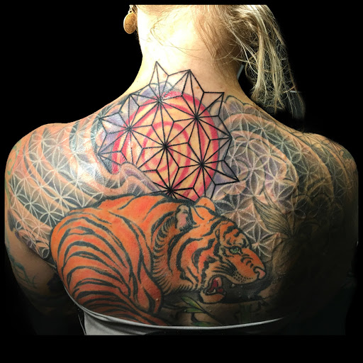 Explore damaged tattoo ideas, creative tattoo ideas in Homer, available at Exotic Eye Tattoo