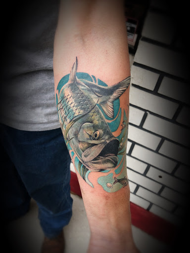 Explore cross with names tattoo ideas, creative tattoo ideas in Crystal River, available at Radiant Custom Tattoo & Body Piercing