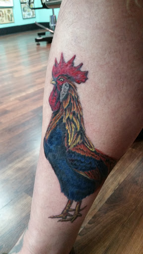 Explore large thigh tattoo ideas, creative tattoo ideas in Reno, available at Evolution Tattoo