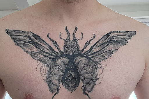 Explore just keep swimming tattoo ideas, creative tattoo ideas in Spokane, available at Fortunata Tattoo Studio