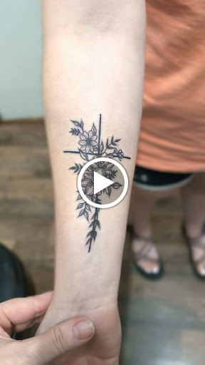 Explore rainbow baby tattoo ideas, creative tattoo ideas in Cornelia, available at Prismatic Pulse Tattoo