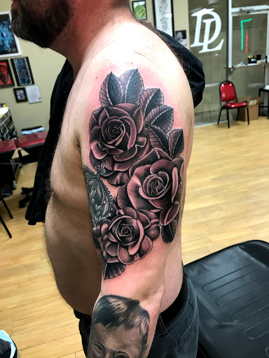 Explore broken heart tattoo ideas for guys, creative tattoo ideas in Liberty, available at Dark Lotus Tattoo & Salon