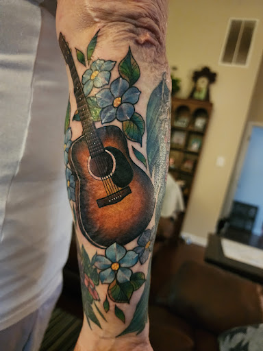 Explore forearm arm tattoo ideas, creative tattoo ideas in Marietta, available at Mystic Owl Tattoo