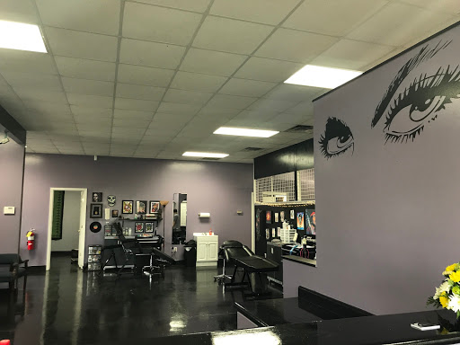 Explore lower back tattoo cover up ideas, creative tattoo ideas in Tifton, available at Embody Art Tattoo Studio