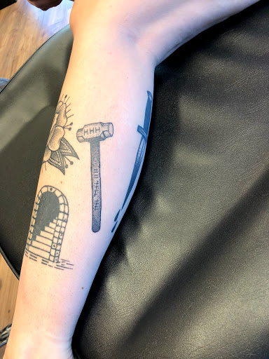 Explore skull and crossbones tattoo ideas, creative tattoo ideas in Lees Summit, available at Bleeding Heart Tattoo