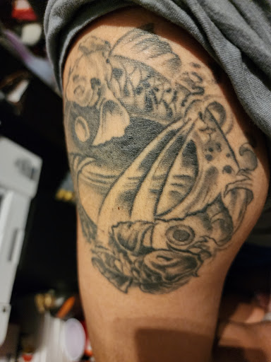 Explore dog and cat tattoo ideas, creative tattoo ideas in Pearland, available at Black List Tattoo & Piercing Co.