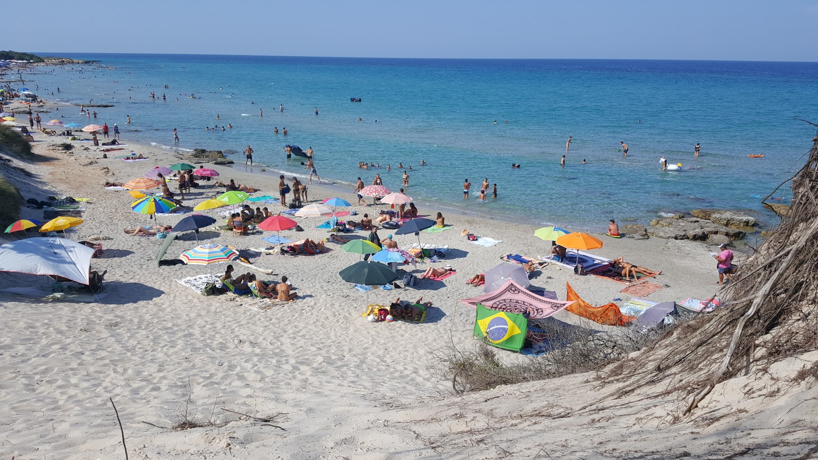 Fotografija Frassanito beach z modra čista voda površino