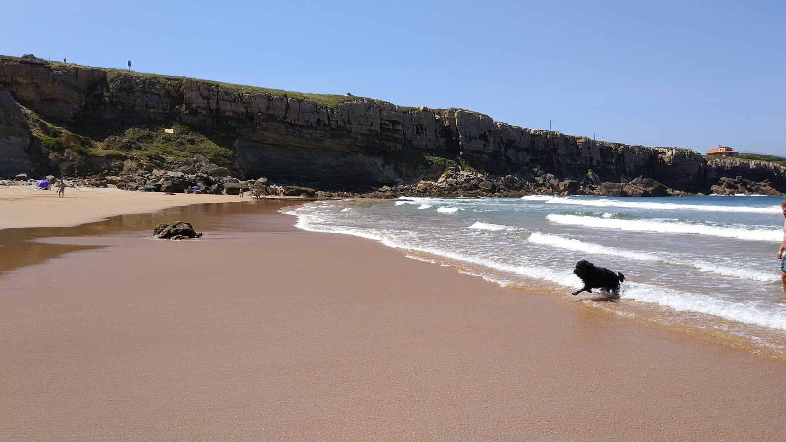 Fotografie cu Playa de los Caballos cu o suprafață de nisip strălucitor